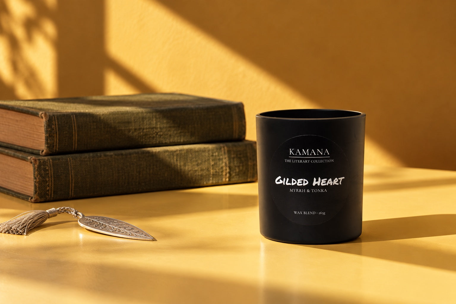 Gilded Heart candle with clothbound books