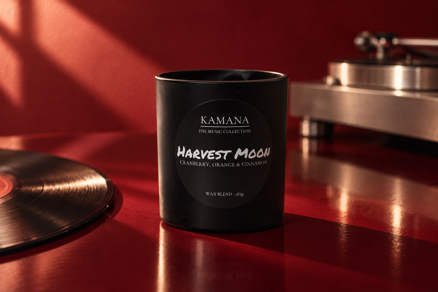 Harvest Moon candle with vinyl and a turntable